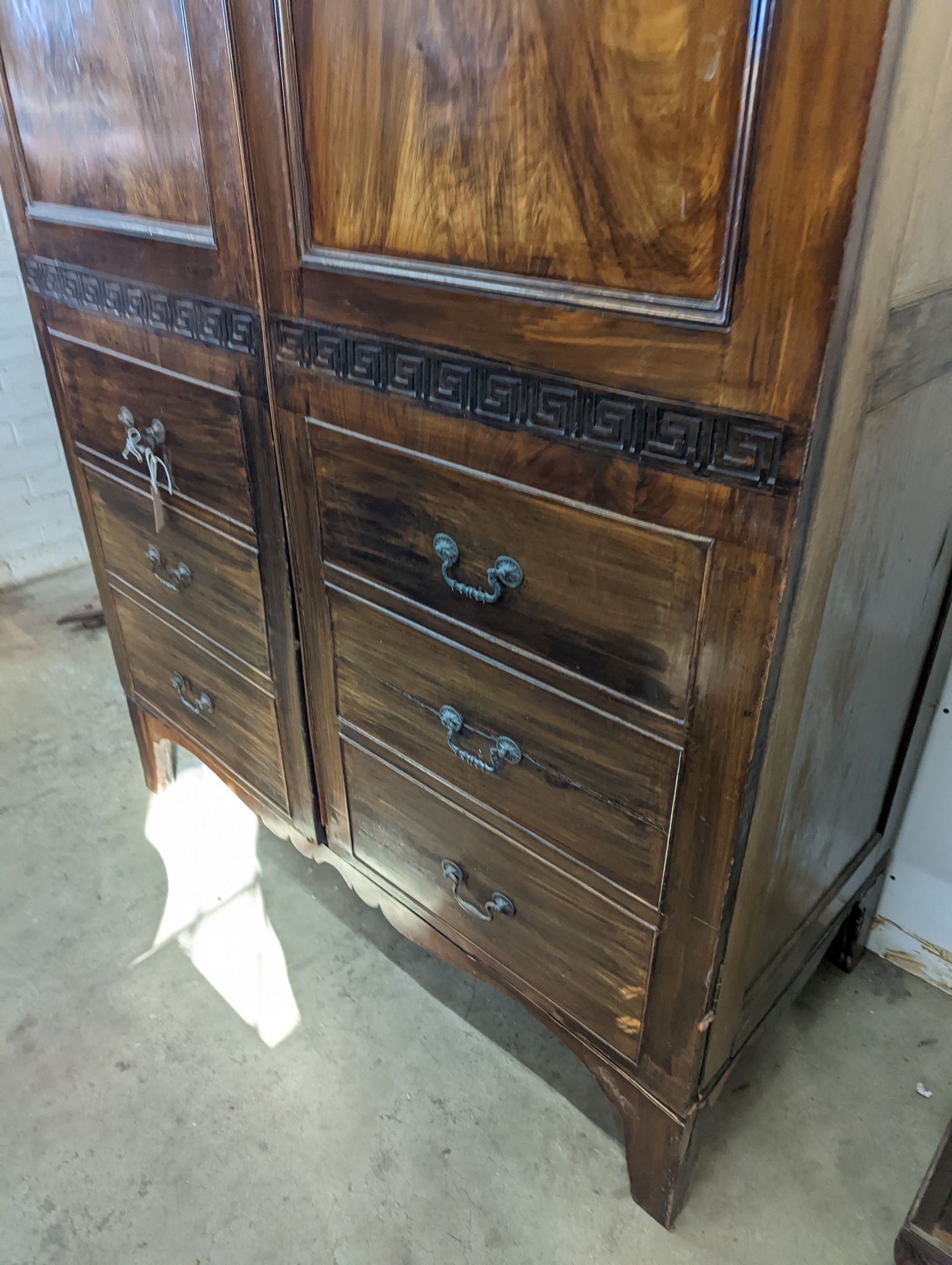 A George IV style mahogany hanging cupboard, width 142cm, depth 65cm, height 209cm